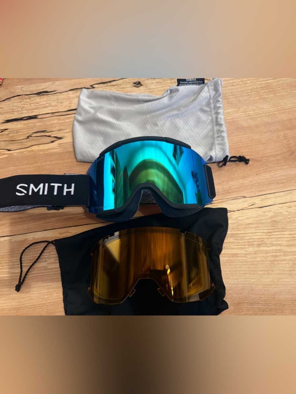 SMITH blue mirrored snow goggles with amber replacement lens
